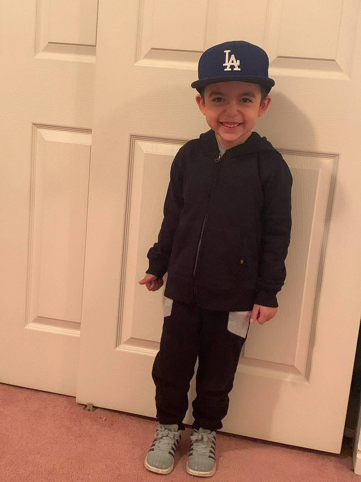 Carlos Daniel joined the competition — help win amazing prizes! baseball_cap, cap, child, clothing, cool, denim, fashion_accessory, footwear, hat, headgear, headwear, jacket, joy, male, outerwear, person, shoe, sleeve, standing, style