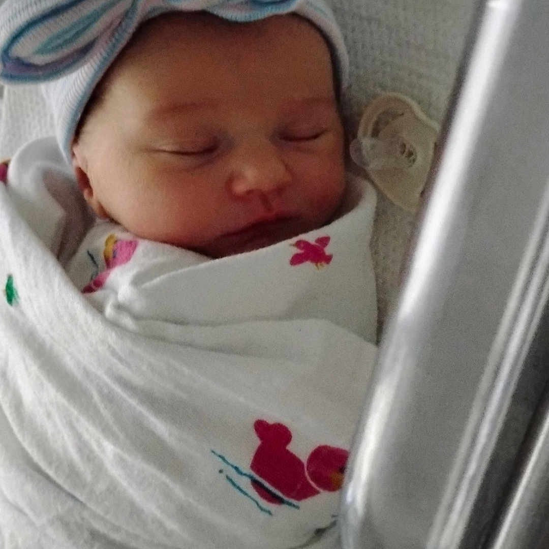 Ember joined the competition — help win amazing prizes! baby, bed, blanket, bow, child, closeup, crib, cute, hat, indoors, infant, newborn, pacifier, peaceful, portrait, resting, sleeping, soft, swaddle, wrapped