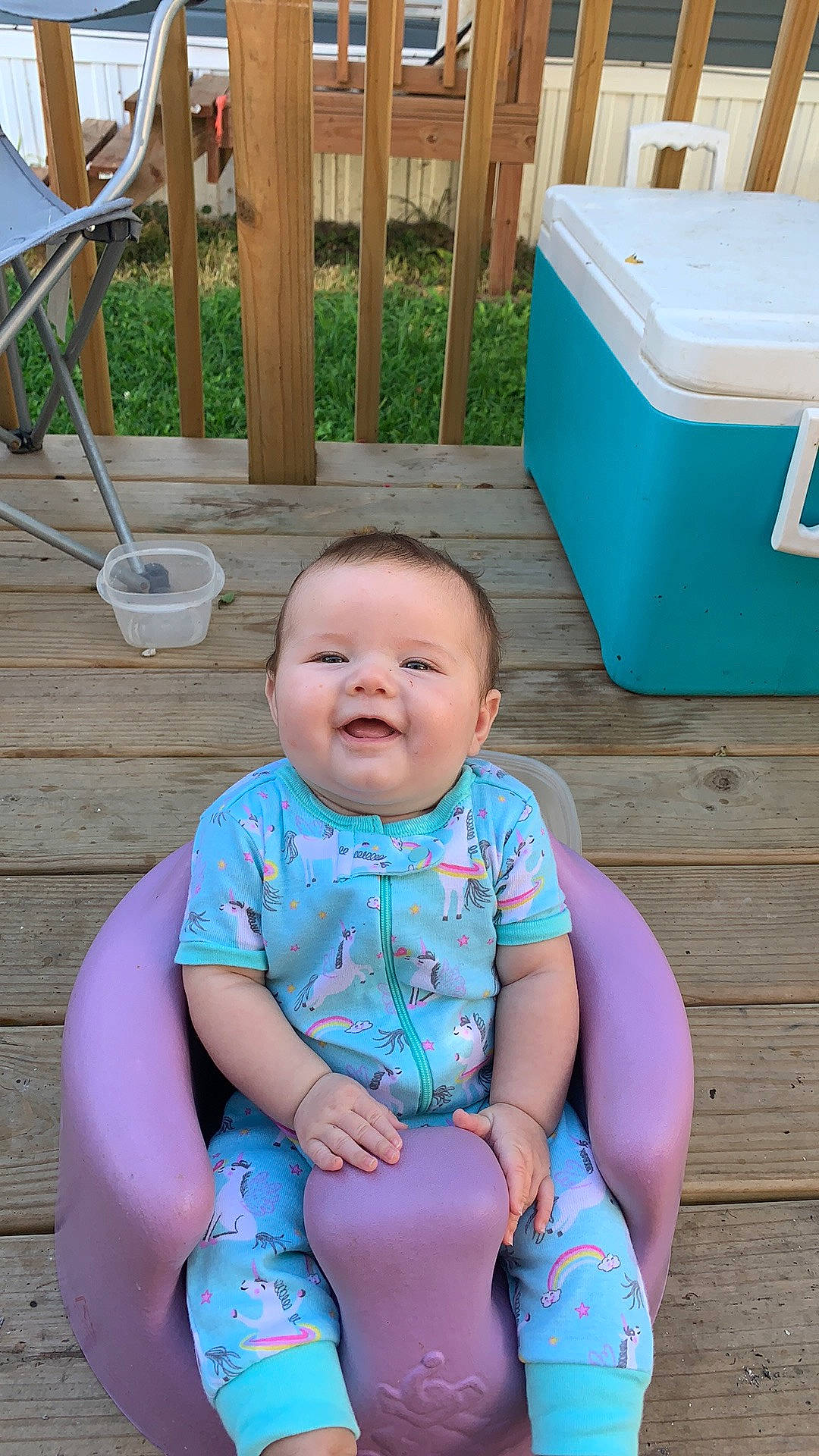 Zoei joined the competition — help win amazing prizes! baby, baby_toddler_clothing, child, fun, leisure, people, person, pink, play, product, sitting, smile, summer, toddler, turquoise, vacation