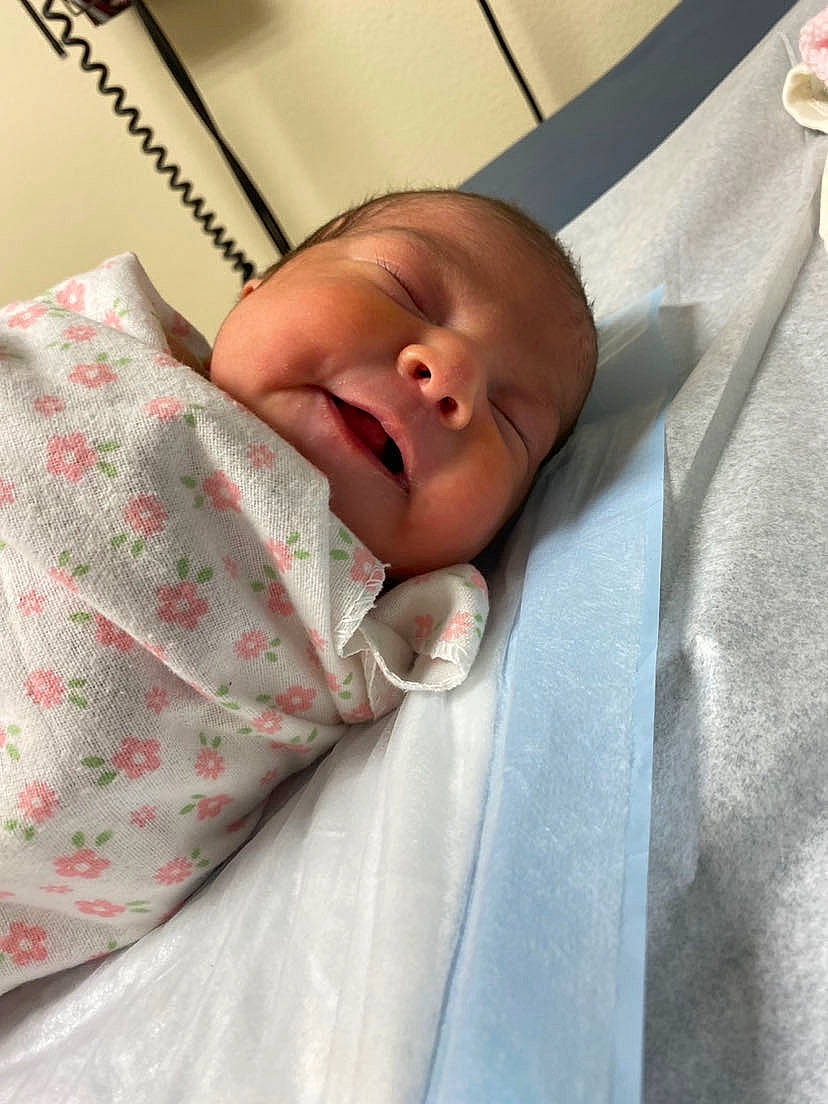 Nevaeh is registered to the contest to win money with this photo: baby, baby_products, baby_sleeping, baby_toddler_clothing, bedding, bedtime, cheek, child, chin, comfort, event, face, head, iris, kitchen_utensil, linens, person, room, skin, sleep