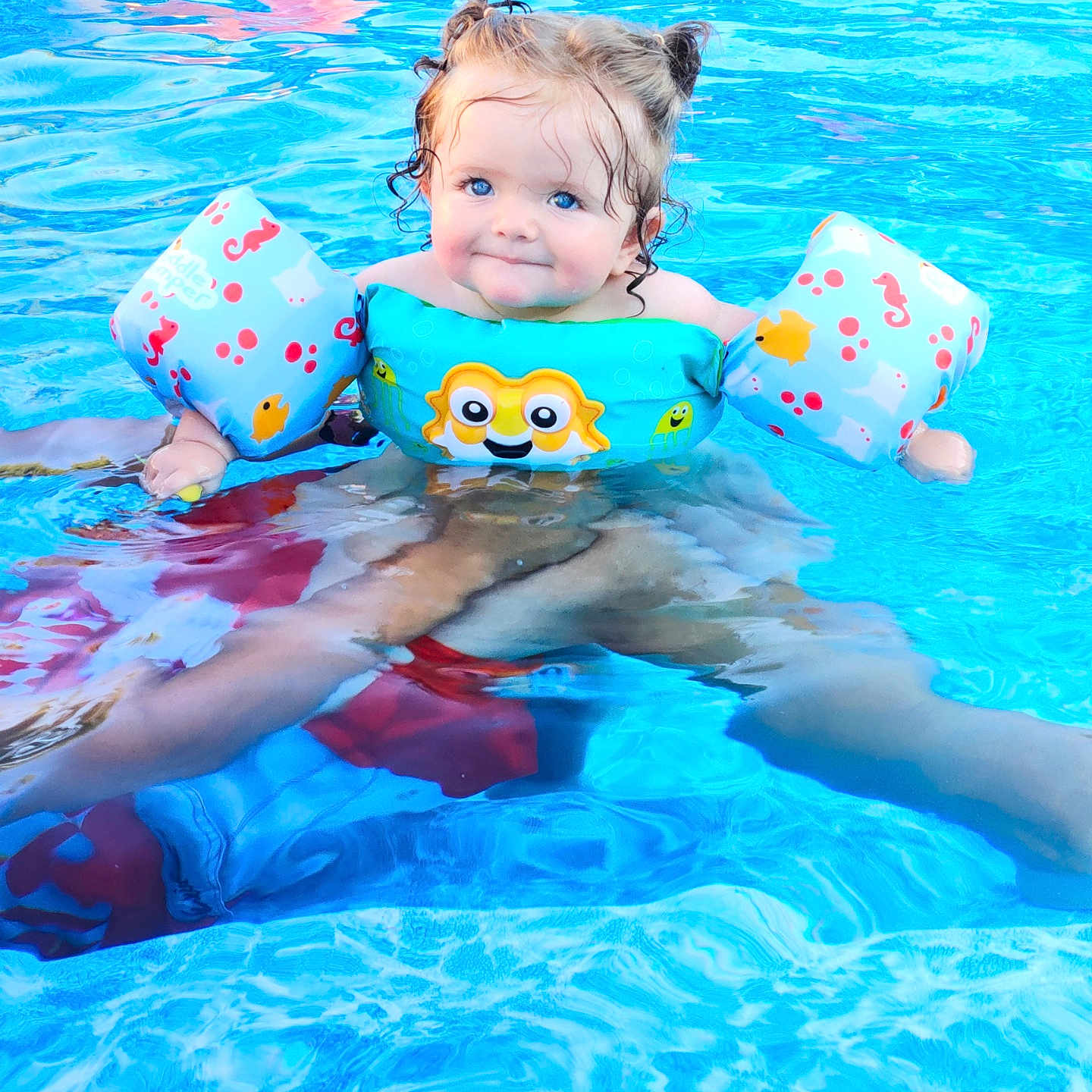 Jaylyn joined the competition — help win amazing prizes! baby, clothing, face, head, leisureactivities, lifejacket, nature, outdoors, person, photography, pool, portrait, sport, summer, swimming, swimmingpool, swimwear, vest, water, watersports