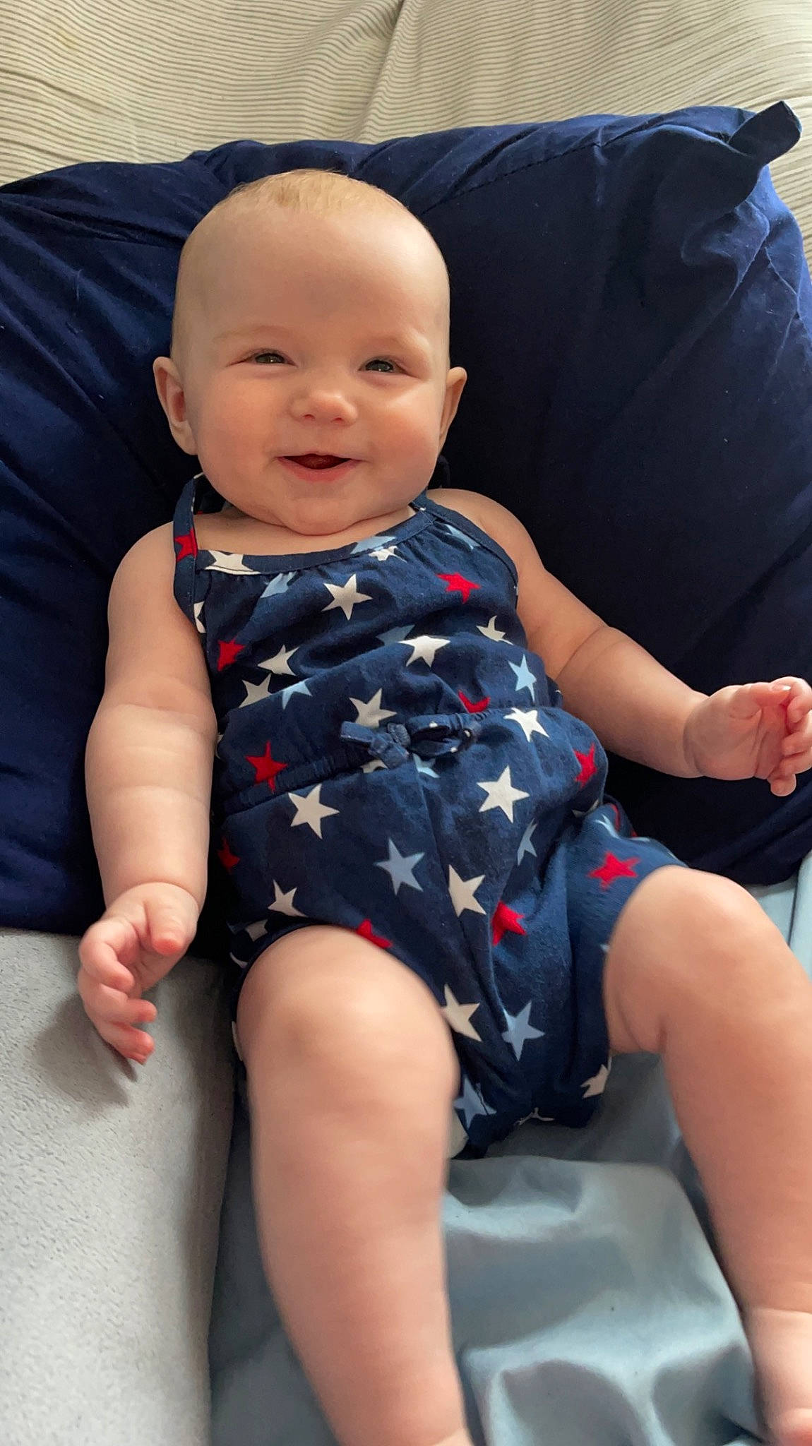 Evelynn is registered to the contest to win money with this photo: baby, baby_toddler_clothing, cheek, child, comfort, electric_blue, finger, happy, human_leg, joy, knee, lap, leg, person, shoulder, skin, sleeve, smile, t_shirt, thigh