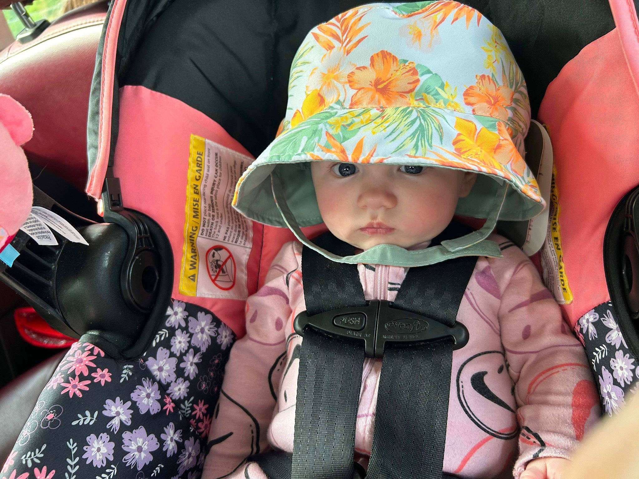 Evelynn is registered to the contest to win money with this photo: baby, baby_carriage, baby_toddler_clothing, cap, child, cool, eye, fun, hat, headgear, headwear, mammal, people, person, photograph, pink, product, skin, sun_hat, textile
