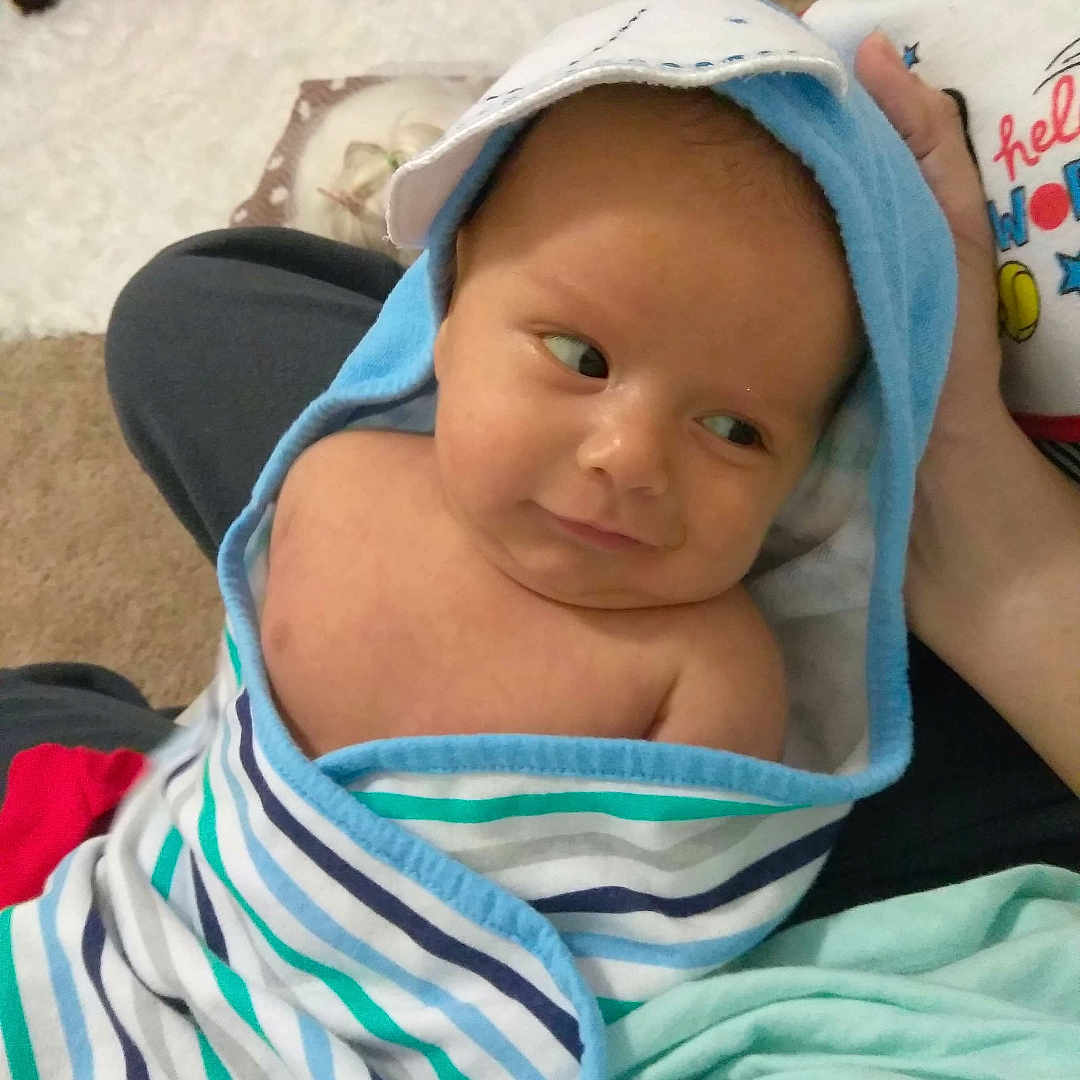 Douglas is registered to the contest to win money with this photo: abdomen, arm, child, day, eye, face, fun, girl, head, headgear, infant, person, product, skin, smile, toddler