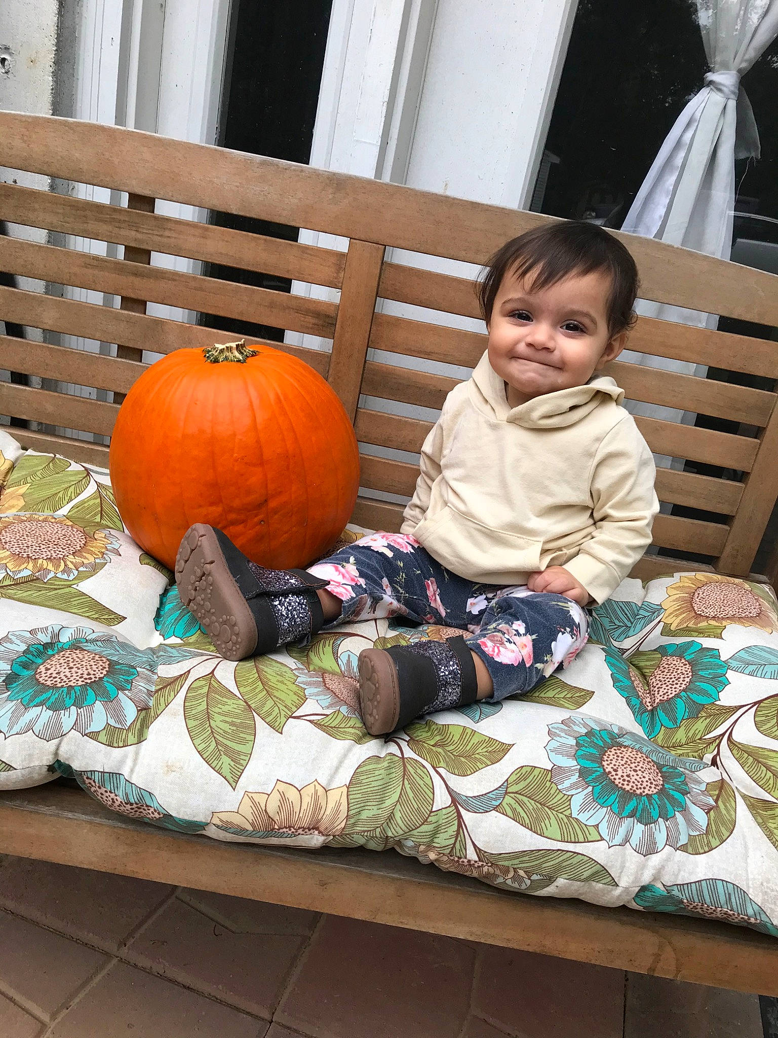 Halle joined the competition — help win amazing prizes! calabaza, child, couch, cucurbita, fruit, furniture, gourd, joy, lighting_accessory, person, plant, pumpkin, room, squash, toddler, vegetable, winter_squash