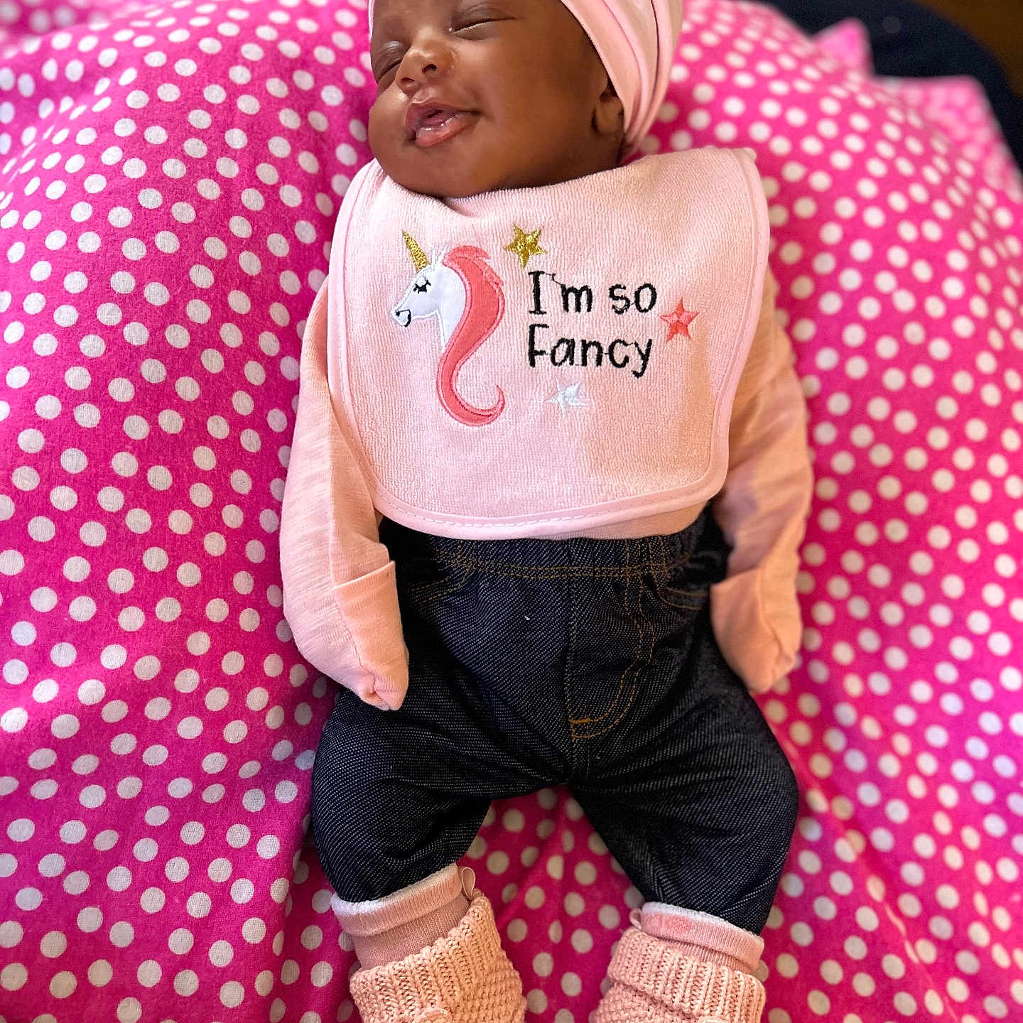 Honesti joined the competition — help win amazing prizes! baby, blanket, bonnet, clothing, couch, face, footwear, furniture, happy, hat, head, pants, pattern, person, photography, portrait, shoe, sitting, smile, sneaker