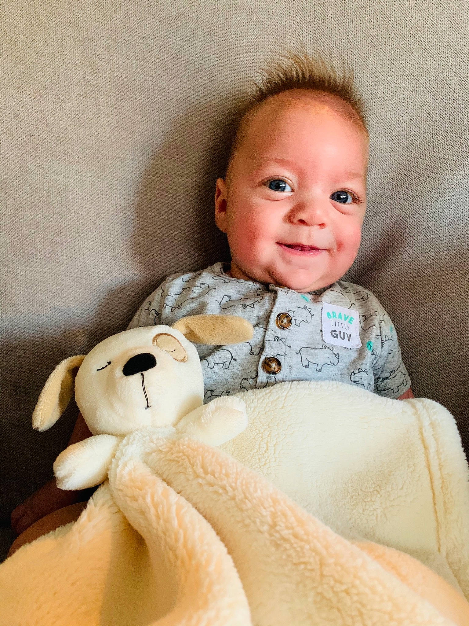 Rustin joined the competition — help win amazing prizes! baby_products, baby_toddler_clothing, baby_toys, beige, cheek, child, comfort, eyebrow, facial_expression, happy, iris, joy, lip, person, plush, product, sitting, skin, stuffed_toy, textile