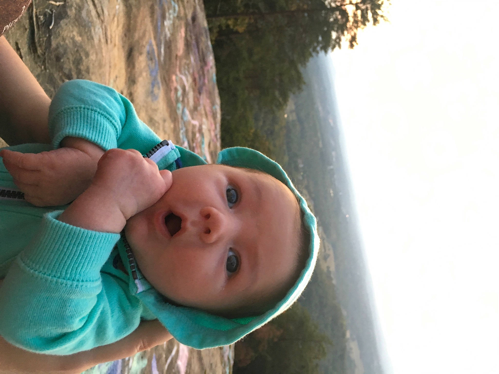 Angelo is registered to the contest to win money with this photo: baby, child, green, headwear, person, skin, smile, toddler