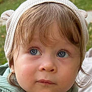 Richard joined the competition — help win amazing prizes! toddler, child, face, blue_eyes, hat, knit_hat, beige_hat, curly_hair, outdoor, portrait, close_up, cute, apparel, headwear, expression, young_child, soft_lighting, nature_background, casual_clothing, curious