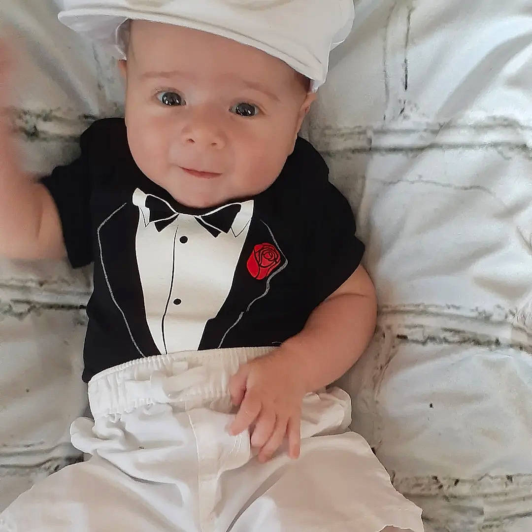 Ares joined the competition — help win amazing prizes! arm, baby, baby_toddler_clothing, bow_tie, child, collar, comfort, costume_hat, dress, eye, face, flash_photography, formal_wear, happy, hat, headwear, human_body, person, sleeve, smile