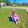 Everly joined the competition — help win amazing prizes! blue_chair, casual, child, curious, daylight, grass, greenery, house, nature, outdoor, pink_dress, shoes, side_view, small_chair, street, suburban, summer, sunny, toddler, young_child
