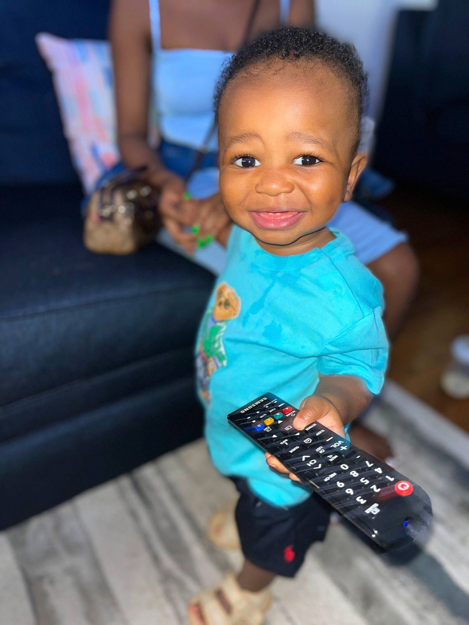 Adaire is registered to the contest to win money with this photo: chair, child, communication_device, couch, electric_blue, event, eye, fashion_design, flash_photography, fun, gadget, happy, input_device, joy, leisure, netbook, office_equipment, person, smile, street_fashion