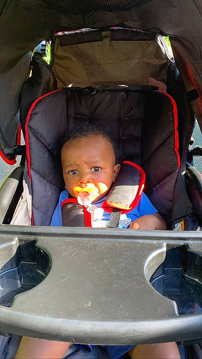 Adaire is registered to the contest to win money with this photo: auto_part, automotive_design, automotive_exterior, automotive_lighting, baby, baby_carriage, baby_products, baby_safety, car_seat, carmine, cheek, child, comfort, fun, motor_vehicle, person, sitting, toddler, trunk, vehicle_door