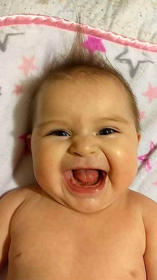 Beatrice is registered to the contest to win money with this photo: baby, baby_making_funny_faces, cheek, child, chin, close_up, eye, eyebrow, face, facial_expression, forehead, head, joy, laugh, lip, mouth, neck, nose, person, skin