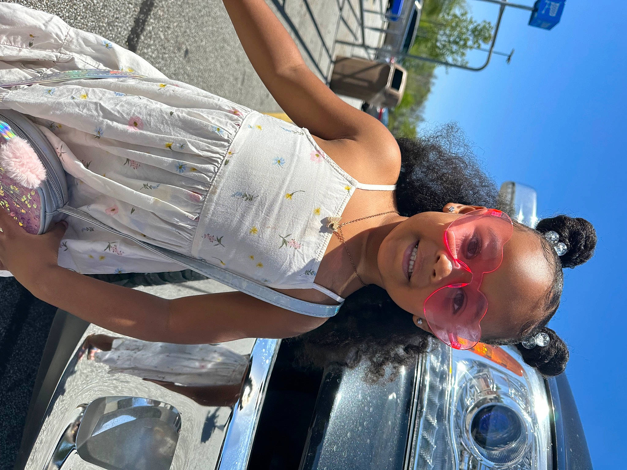 Harmony joined the competition — help win amazing prizes! blue, daytime, eyewear, fun, human_leg, joy, leisure, motor_vehicle, person, sky, snapshot, t_shirt, thigh, travel, waist, white