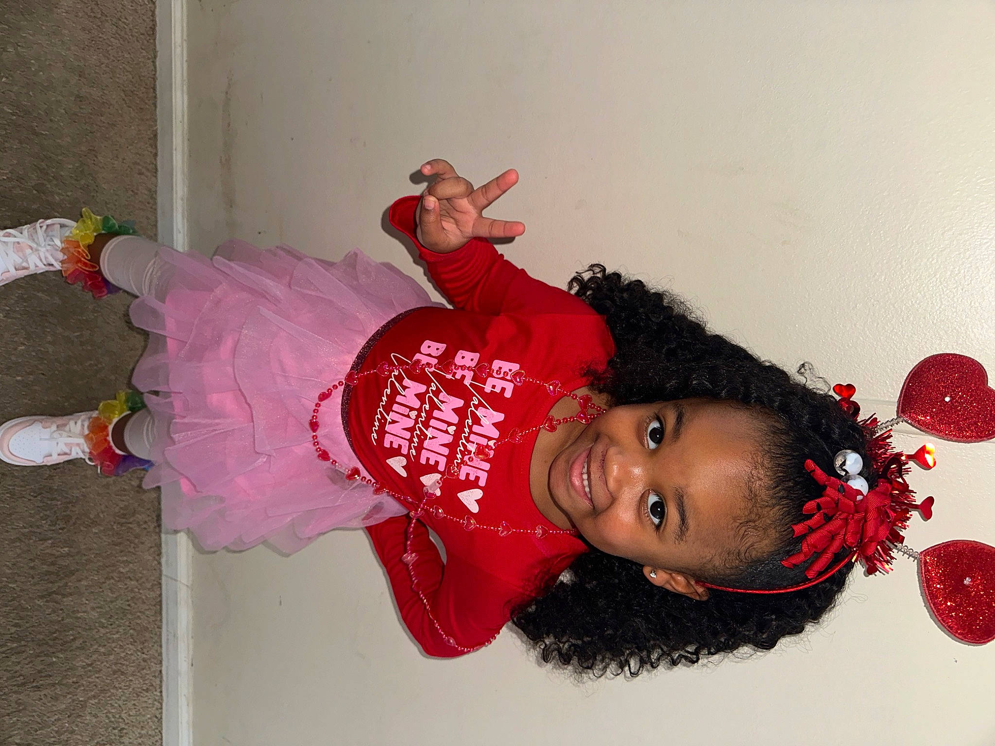 Harmony is registered to the contest to win money with this photo: baby_toddler_clothing, child, costume, event, fashion_design, fun, happy, hat, jewellery, joy, magenta, person, pink, red, room, skin, smile, textile, toddler