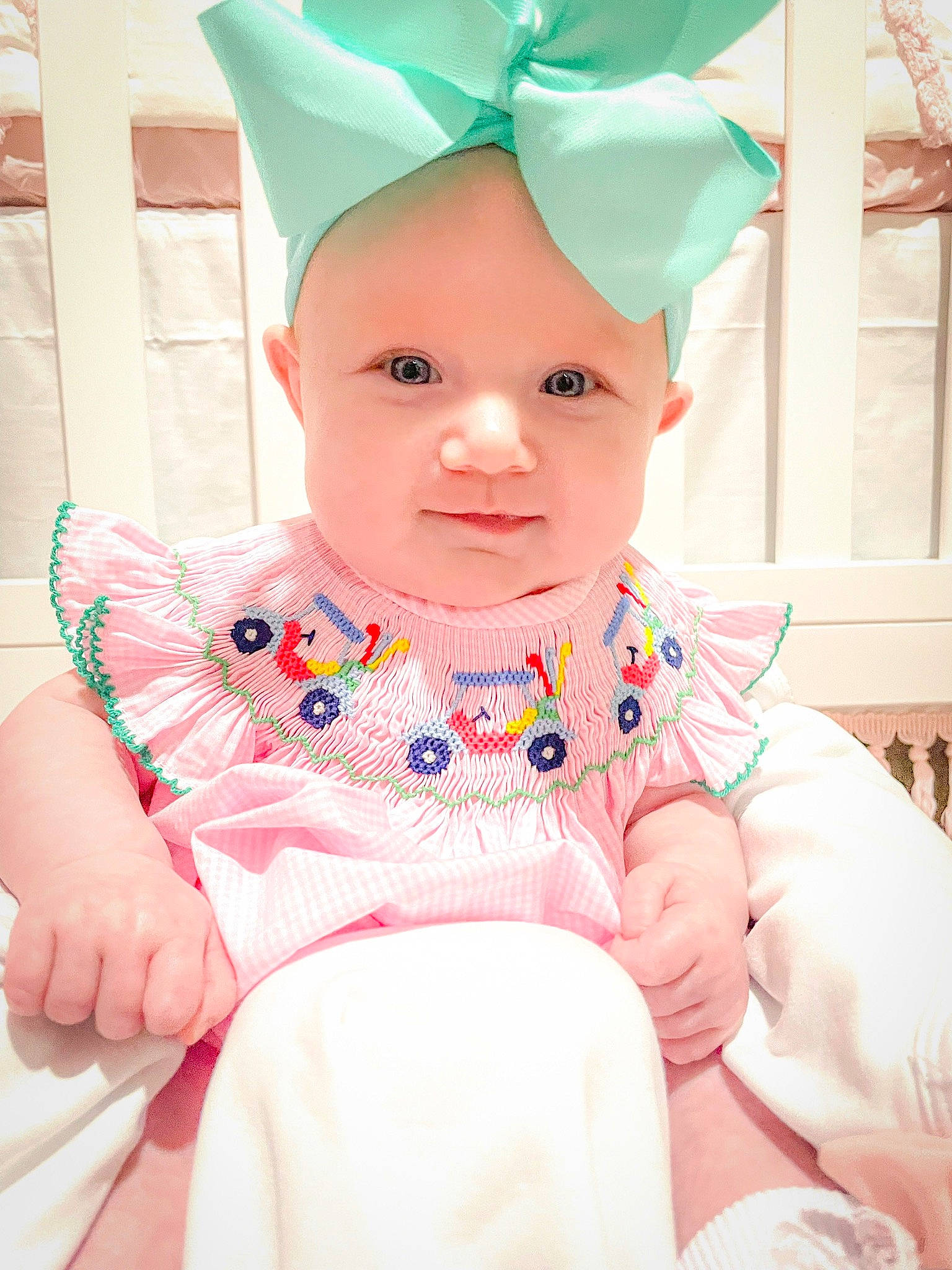 Karsyn is registered to the contest to win money with this photo: baby, baby_toddler_clothing, child, costume_hat, event, face, fashion_accessory, hair_accessory, happy, head, headgear, headwear, magenta, party_supply, pattern, peach, person, pink, product, sleeve