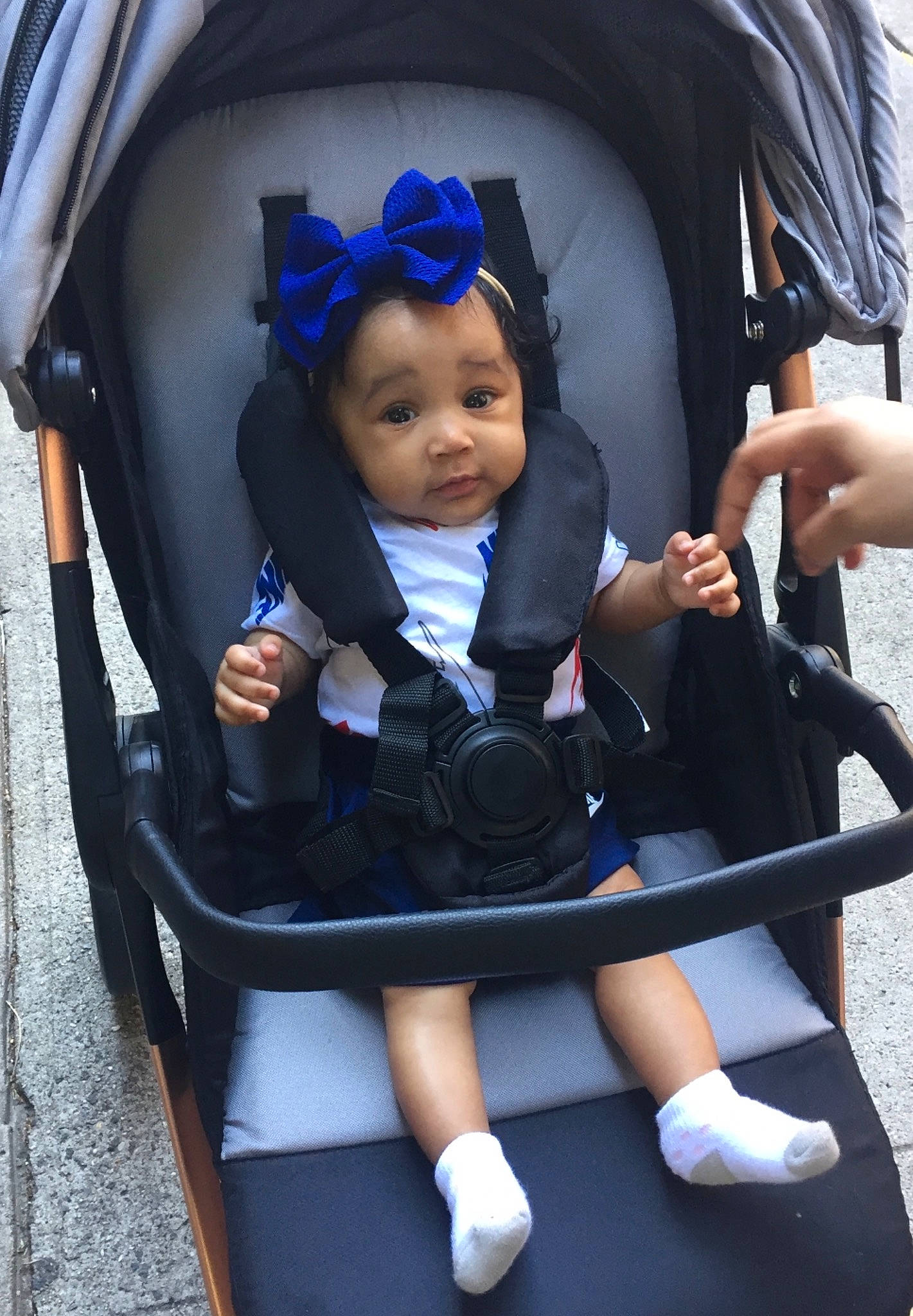 Harmoni-ann is registered to the contest to win money with this photo: baby, baby_carriage, baby_products, baby_safety, baby_toddler_clothing, black, blue, chair, child, electric_blue, fashion_accessory, fun, person, product, purple, sitting, snapshot, strap, toddler, toy