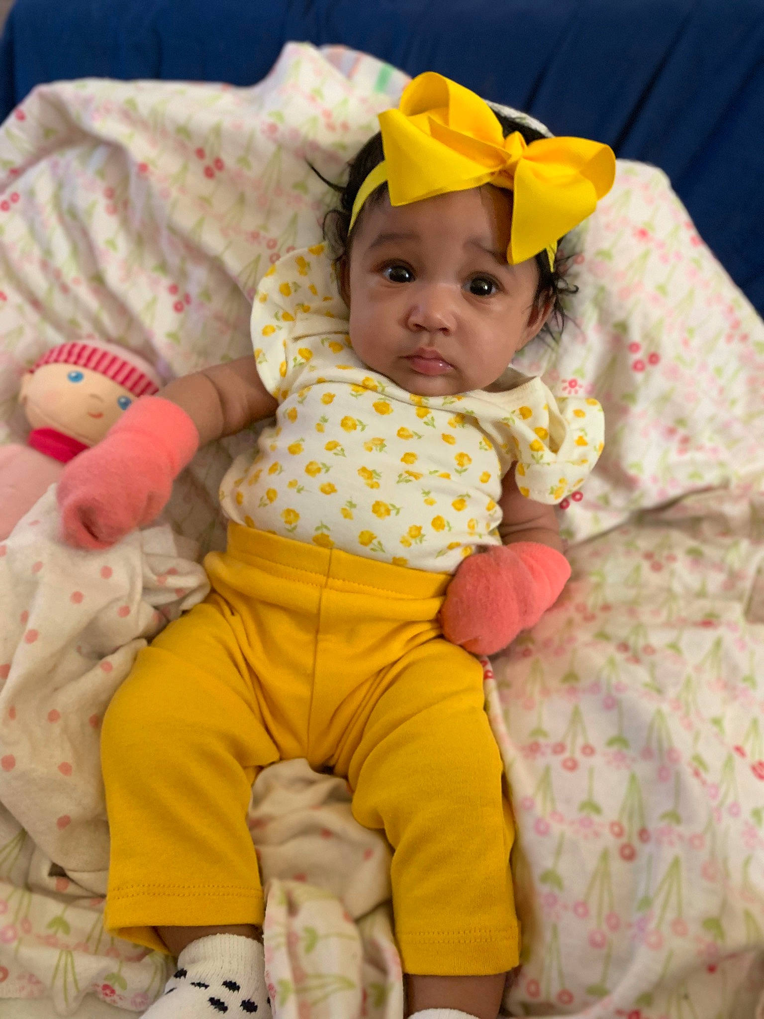 Harmoni-ann is registered to the contest to win money with this photo: baby, baby_products, baby_toddler_clothing, cheek, child, comfort, eye, fun, happy, hat, headwear, human_body, linens, mammal, person, pink, product, skin, sleeve, textile