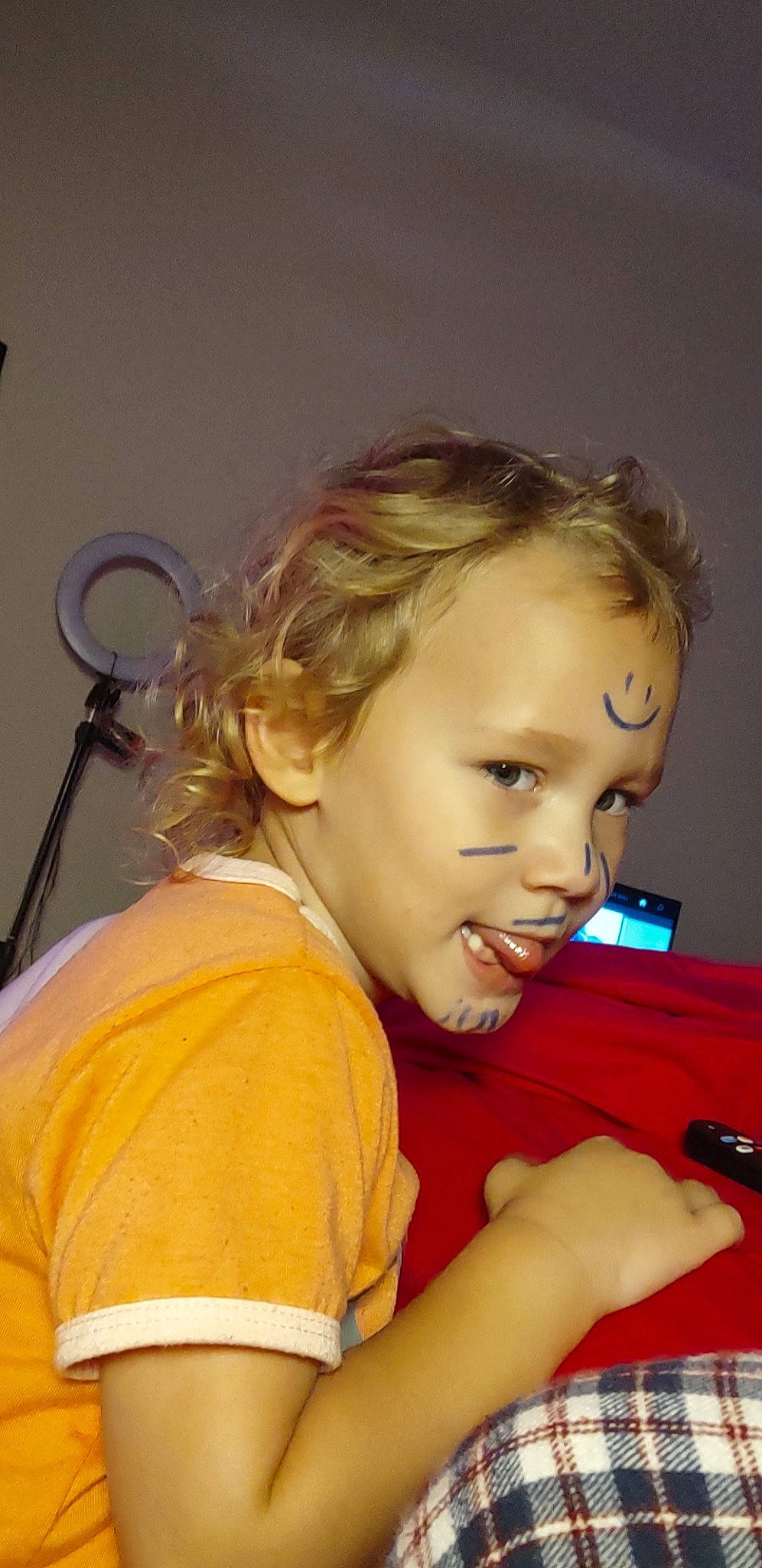 Raelyn is registered to the contest to win money with this photo: audio_equipment, brown_hair, chair, cheek, child, ear, eyelash, flash_photography, fun, happy, hearing, jewellery, lip, long_hair, nose, office_supplies, person, sitting, smile, t_shirt