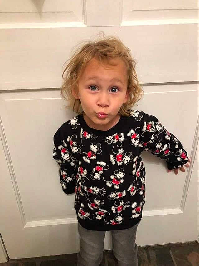 Raelyn is registered to the contest to win money with this photo: baby_toddler_clothing, cheek, child, eye, face, facial_expression, flooring, fun, gesture, hair, happy, head, human_body, iris, nose, person, shoulder, sleeve, smile, surprise