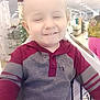 Duwane is registered to the contest to win money with this photo: toddler, child, smiling, hoodie, shopping_cart, indoor, store, shopping, clothing, person, face, baby, cute, happy, retail, aisle, sitting, young_child, casual_wear, portrait