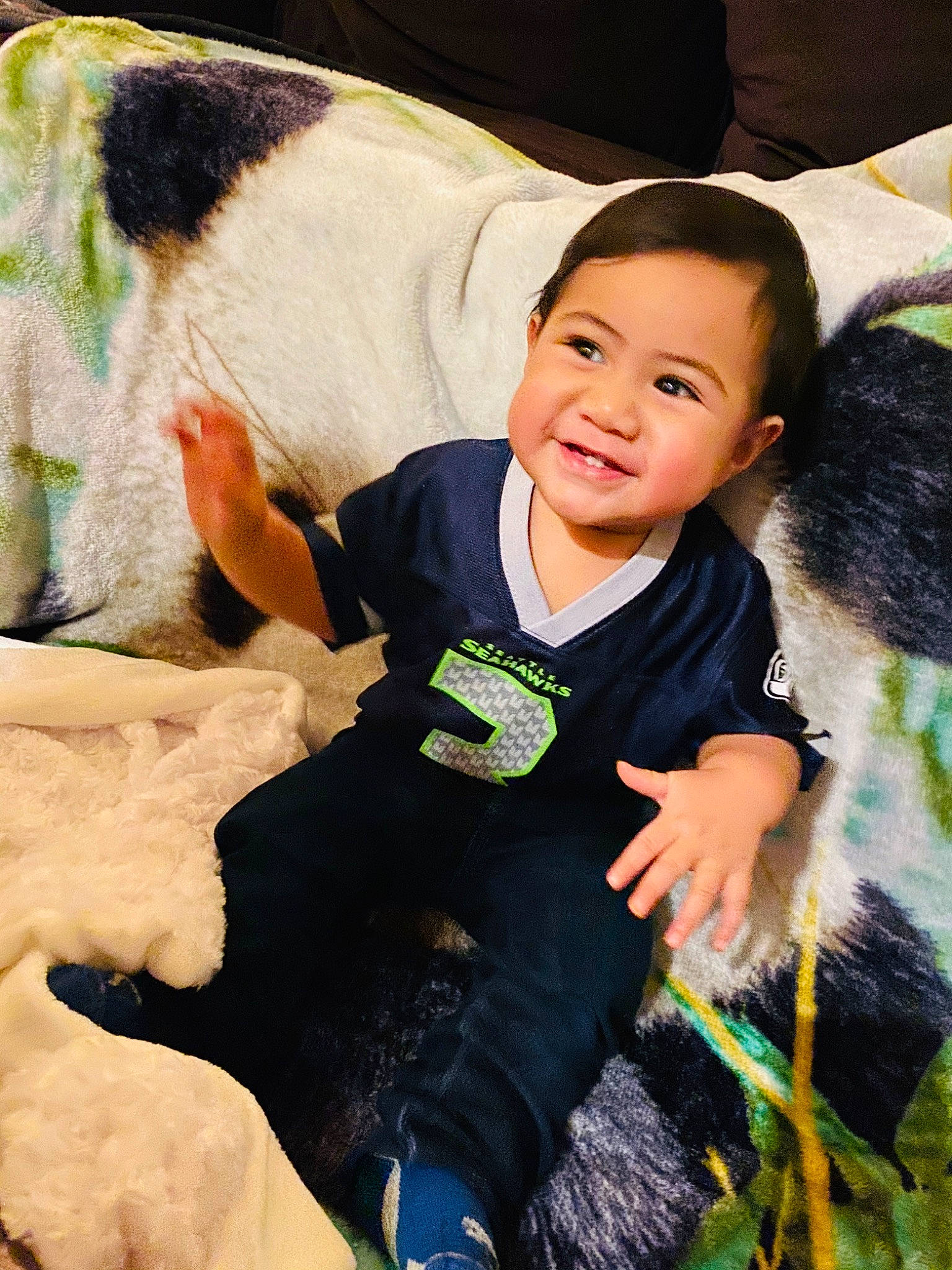 Gregory is registered to the contest to win money with this photo: baby, bovine, child, dairy_cow, ear, fawn, fun, fur, happy, male, person, play, skin, smile, toddler