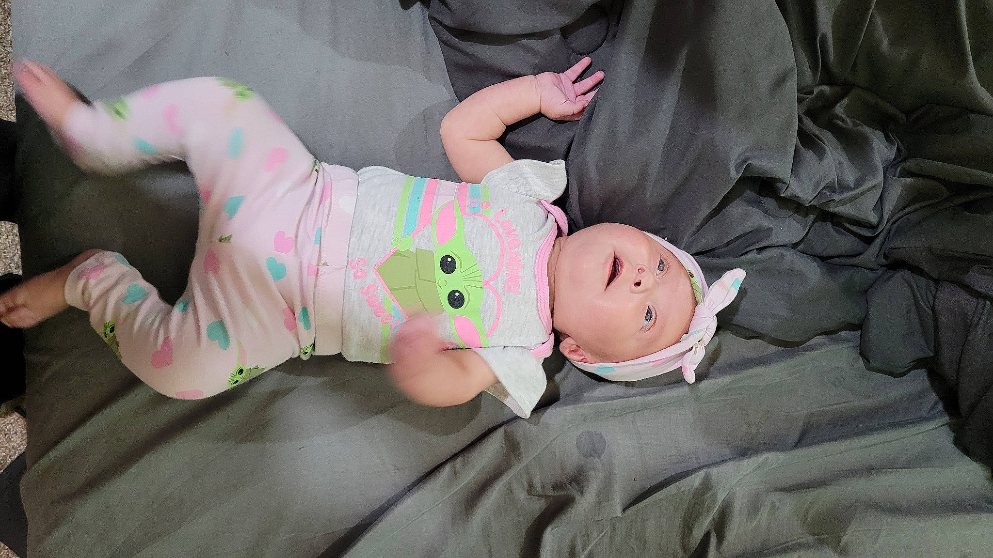 Hailee is registered to the contest to win money with this photo: baby, baby_products, baby_safety, baby_toddler_clothing, cheek, child, comfort, elbow, fun, hat, headwear, knee, linens, mammal, pattern, person, room, sitting, sleeve, toddler