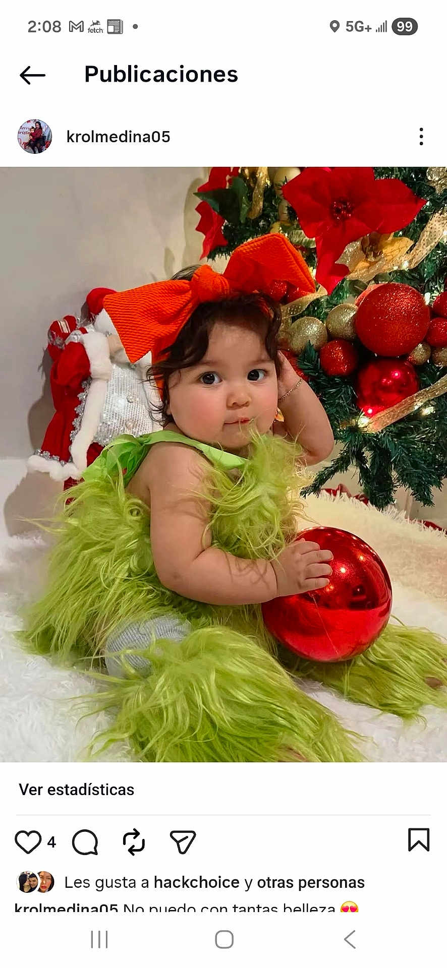 Victoria Sopfia joined the competition — help win amazing prizes! baby, celebration, child, christmas, christmas_tree, curly_hair, cute, decorations, festive, fluffy_clothing, green_outfit, holiday, holiday_decor, holiday_spirit, indoor, ornament, portrait, red_bow, sitting, smiling