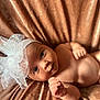 baby, infant, headband, bow, face, skin, hand, blanket, velvet, soft, cute, portrait, child, newborn, lying, naked, expression, closeup, indoor, adorable