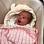Mia joined the competition — help win amazing prizes! newborn, baby, blanket, pink, infant, cute, face, portrait, sleeping_bag, clothing, soft, warm, indoor, resting, child, person, car_seat, newborn_baby, smiling, head