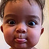 Kayden is registered to the contest to win money with this photo: baby, child, chubby_cheeks, closeup, cute, expression, face, funny_face, hair, head, indoor, innocent, person, playful, portrait, skin, smile, tongue, wide_eyes, young_child
