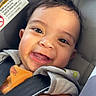 Kayden joined the competition — help win amazing prizes! baby, blanket, car_seat, child, child_safety, closeup, cute, expression, face, happy, head, indoors, infant, orange_clothing, person, portrait, safety, seat_belt, smiling, young_child