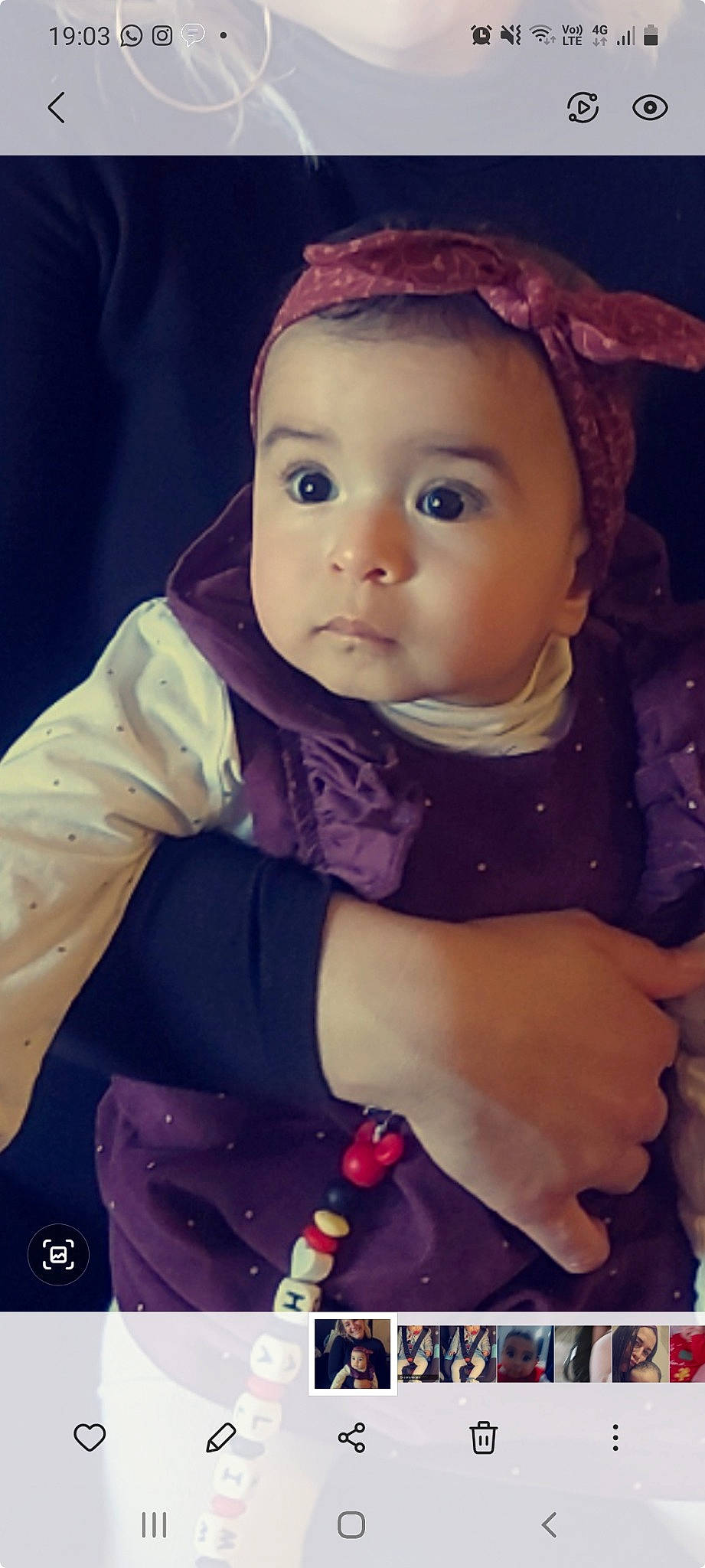 Lina participe au concours pour gagner de l'argent avec cette photo : arm, baby, baby_toddler_clothing, cap, cheek, eye, finger, hand, happy, human_body, iris, lip, nose, organ, outerwear, person, pink, purple, skin, sleeve