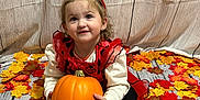 Avery joined the competition — help win amazing prizes! autumn_leaves, black, child, costume, cute, fall, festive, floor, headband, holiday, indoor, ladybug_costume, playful, portrait, pumpkin, red, seasonal, sitting, smiling, toddler