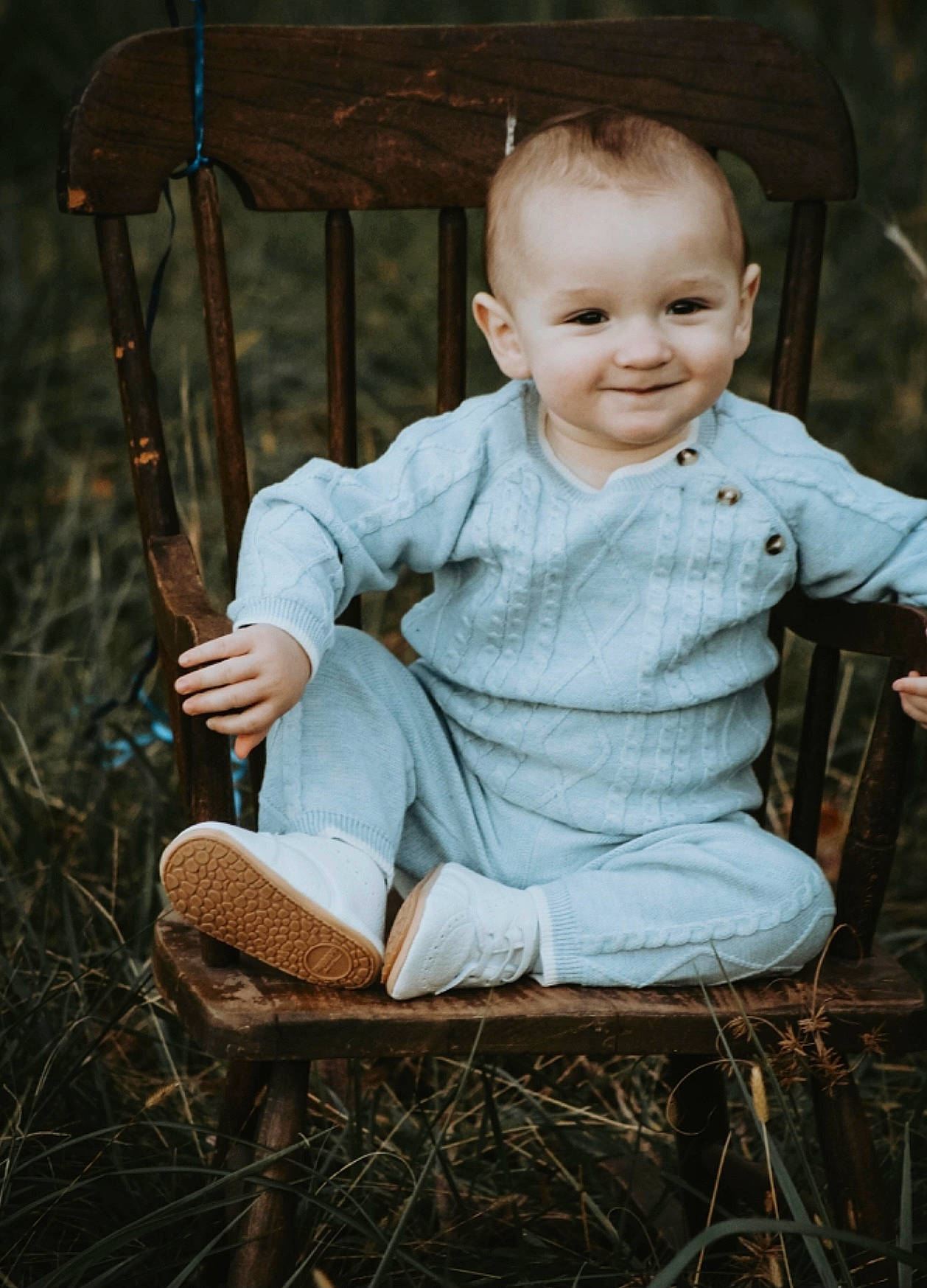 Cruz is registered to the contest to win money with this photo: baby_toddler_clothing, chair, cheek, clothing, facial_expression, flash_photography, fun, grass, hairstyle, hand, happy, human, human_body, iris, joy, leg, person, skin, smile, standing
