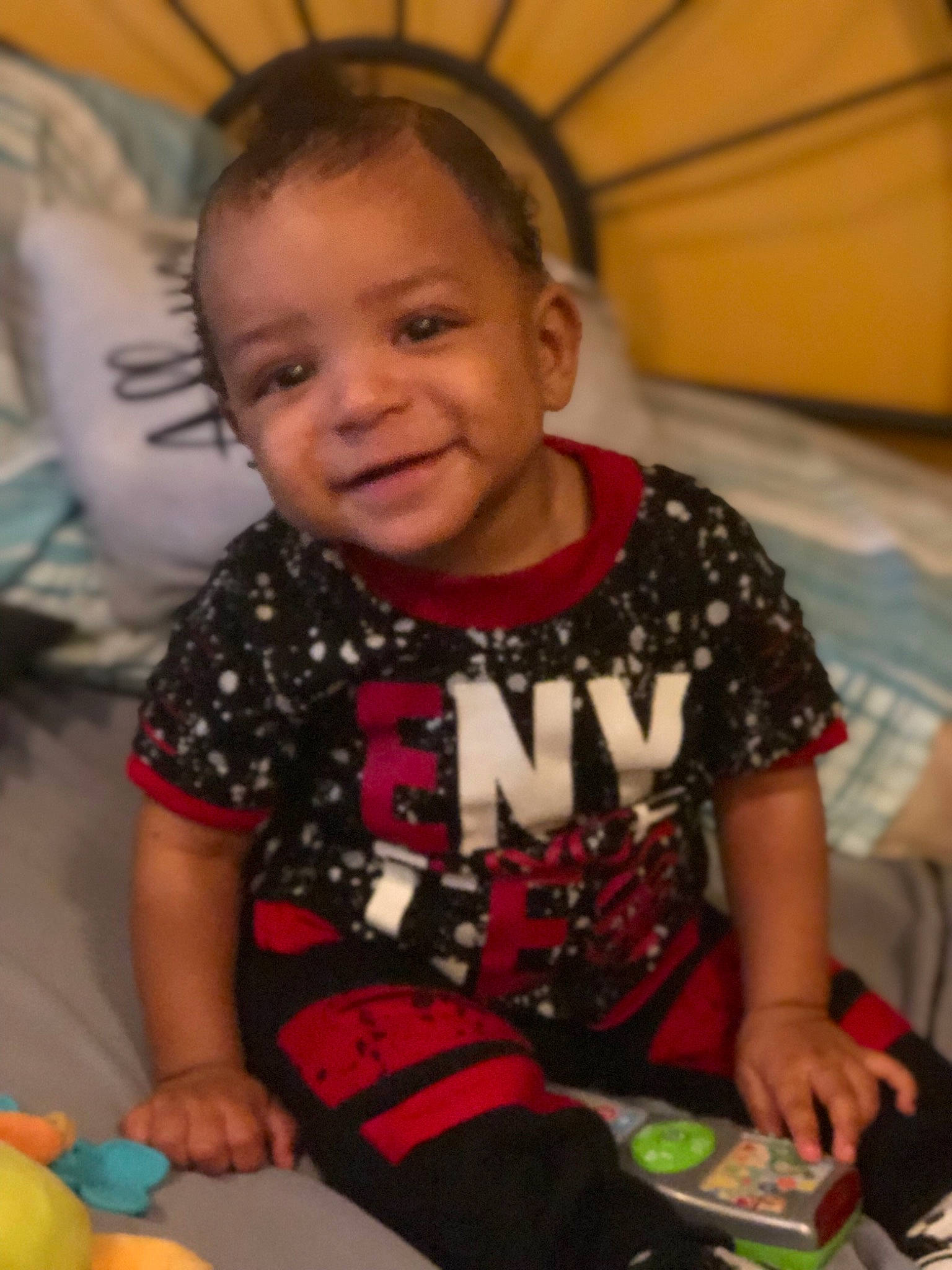 Kymani is registered to the contest to win money with this photo: baby, cheek, child, fun, iris, person, play, sitting, skin, smile, toddler