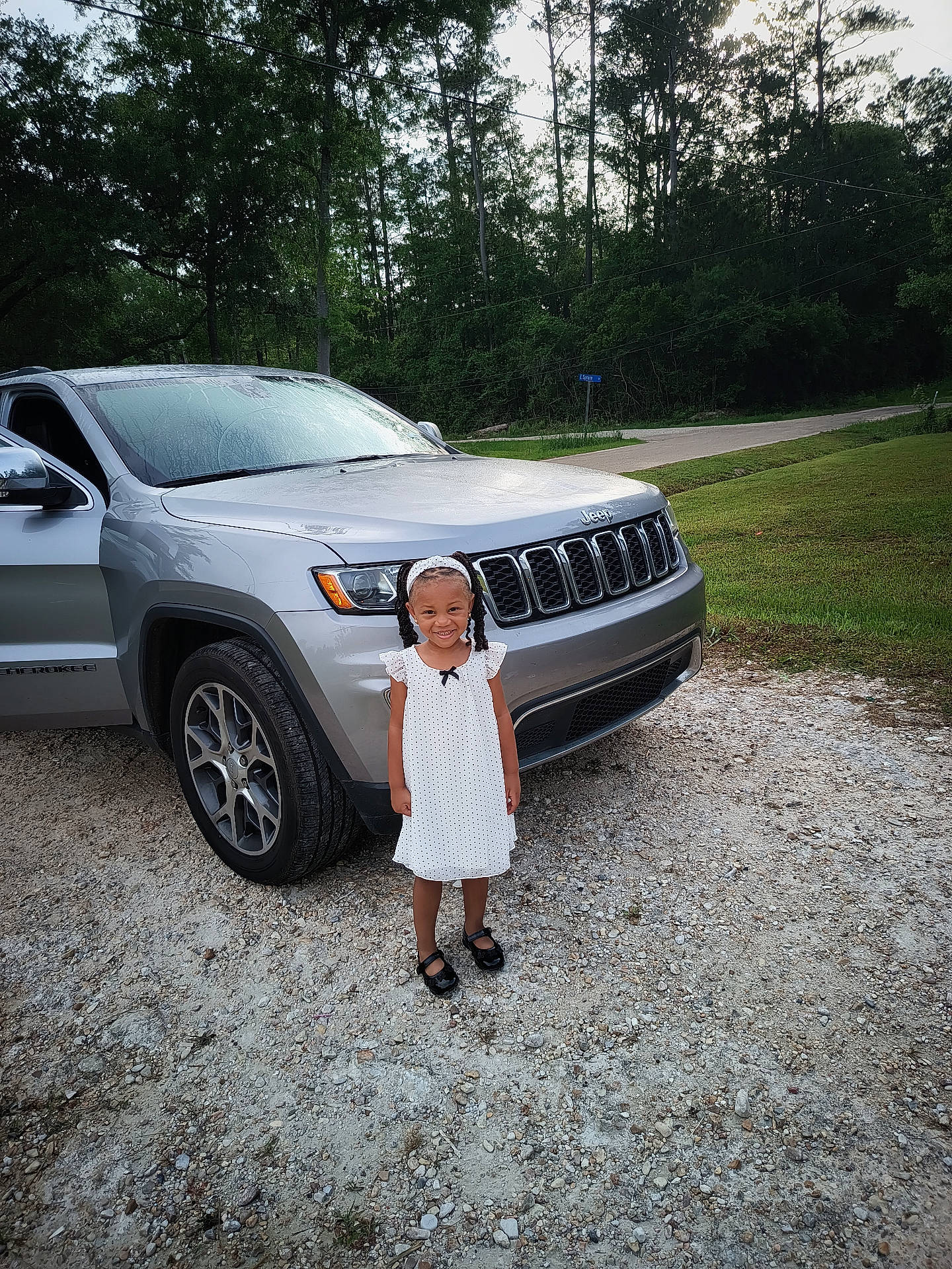Kinsley joined the competition — help win amazing prizes! alloywheel, car, carwheel, child, face, female, girl, head, machine, person, photography, plant, portrait, spoke, suv, tire, transportation, tree, vehicle, wheel
