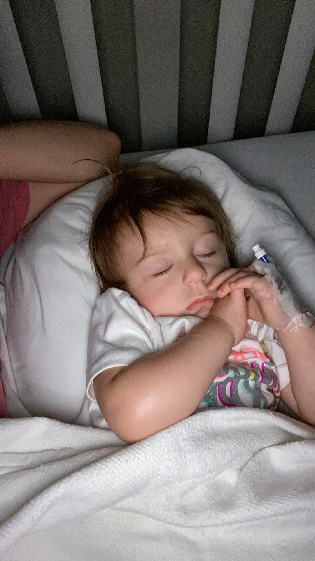 Paisley is registered to the contest to win money with this photo: baby, baby_toddler_clothing, bedtime, cheek, child, comfort, couch, eye, finger, hair, head, linens, mouth, nail, nap, person, room, sitting, skin, textile