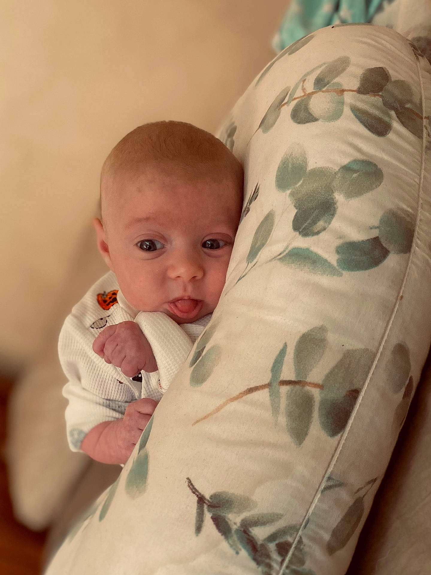 Dalynn is registered to the contest to win money with this photo: baby, bed, bedroom, blanket, bodypart, couch, cushion, face, finger, furniture, hand, head, homedecor, indoors, newborn, person, photography, pillow, portrait, quilt