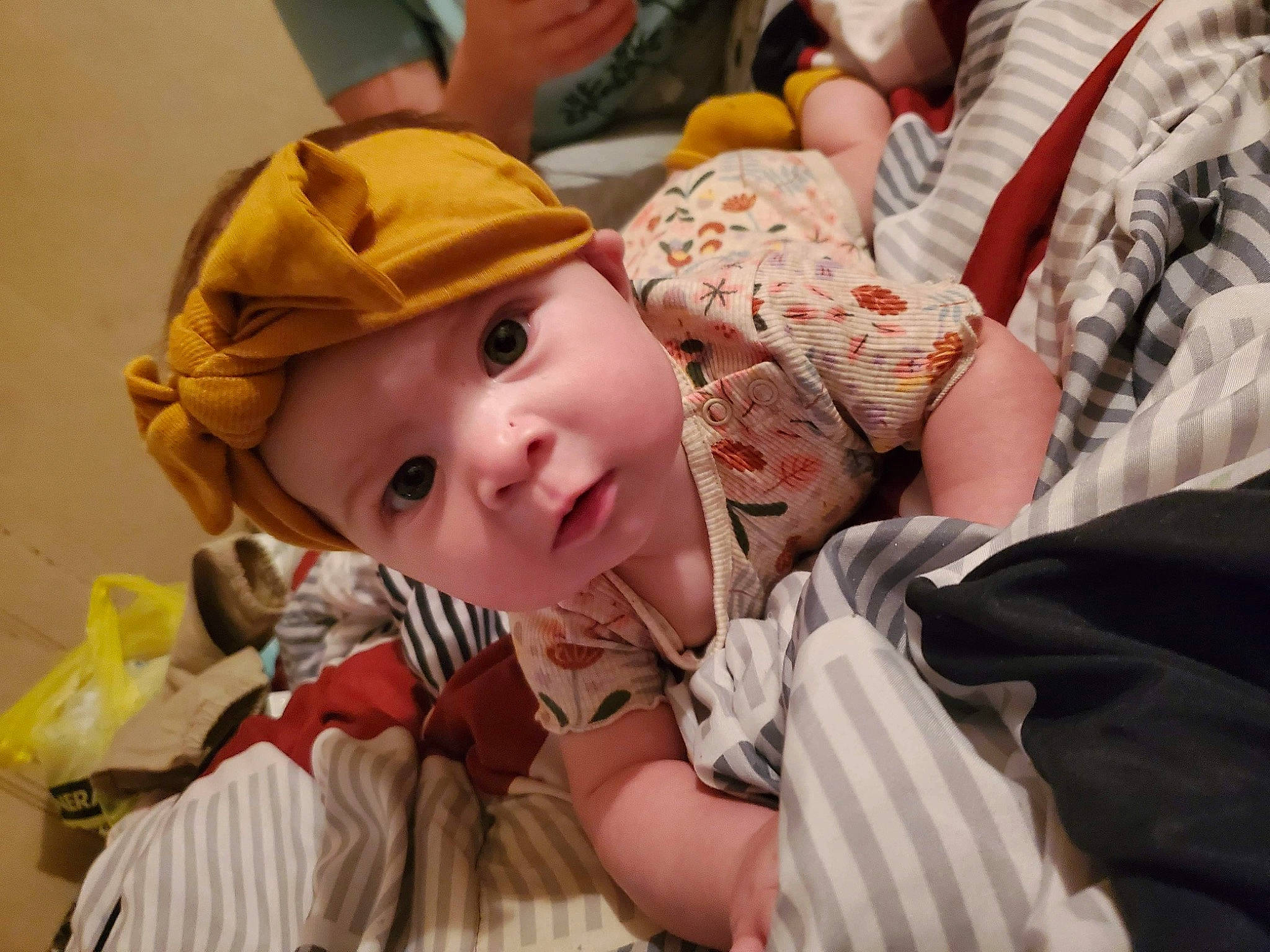 Avaleigh joined the competition — help win amazing prizes! baby, cap, cheek, child, comfort, event, fun, happy, hat, headwear, linens, person, sitting, skin, smile, sun_hat, toddler, tradition, vacation