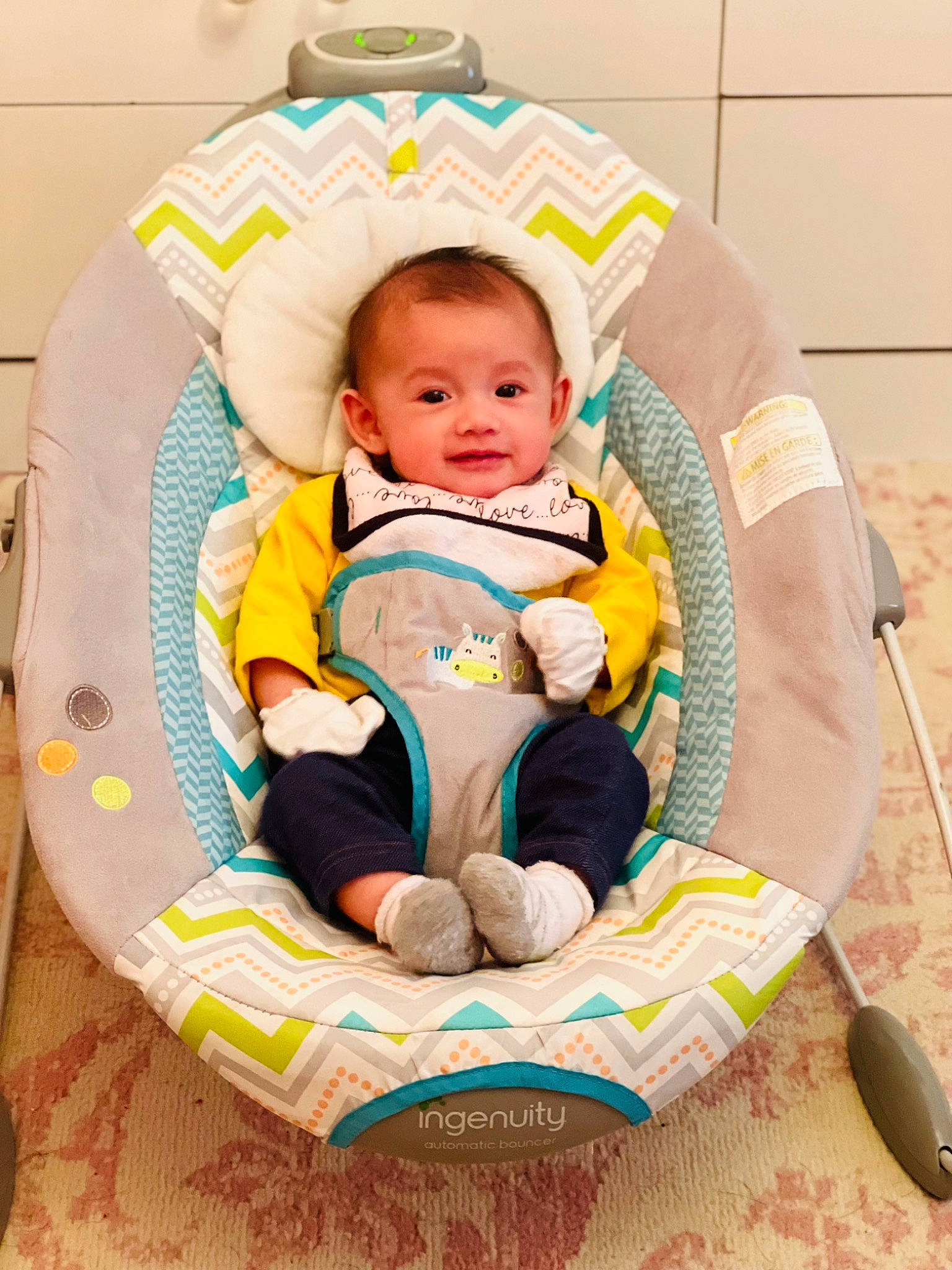 Selena joined the competition — help win amazing prizes! baby, baby_carriage, baby_products, baby_safety, baby_toddler_clothing, baby_toys, chair, child, circle, comfort, cutlery, eye, fashion_accessory, happy, joy, kitchen_utensil, linens, pattern, person, sitting