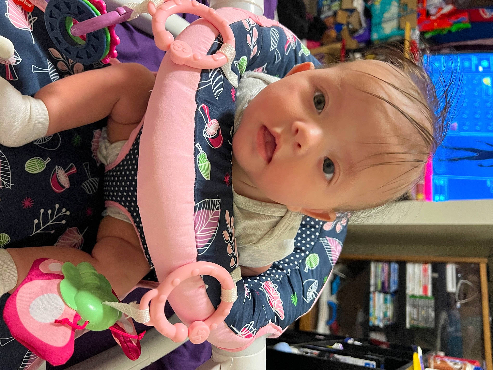 Delilah joined the competition — help win amazing prizes! baby, bookcase, cheek, child, facial_expression, fun, hairstyle, happy, head, headgear, human_body, mouth, nail, person, play, recreation, shelf, skin, thigh, toddler