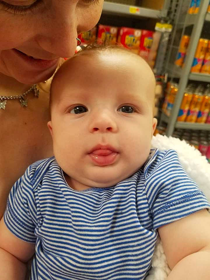 Konner is registered to the contest to win money with this photo: baby, baby_toddler_clothing, cheek, chin, ear, eye, eyebrow, eyelash, face, facial_expression, forehead, happy, iris, lip, mouth, nose, organ, person, shelf, skin