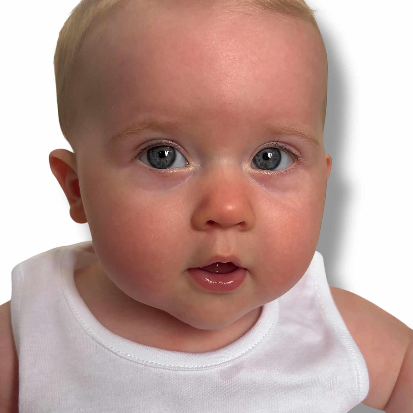 Edie joined the competition — help win amazing prizes! baby, blue_eyes, cheeks, child, close_up, curious, cute, expression, eyelashes, face, head, infant, innocent, mouth, person, portrait, skin, soft_lighting, white_shirt, young_child