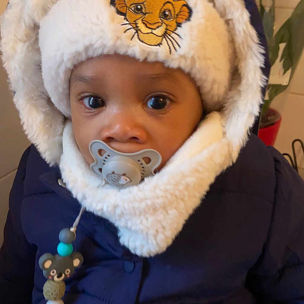 Nathanaël Dos Santos a rejoint le concours — aidez-le/la à gagner de superbes lots ! accessories, baby, bonnet, cap, clothing, coat, face, hat, head, hood, hoodie, jacket, jewelry, knitwear, necklace, person, photography, portrait, sweater, sweatshirt