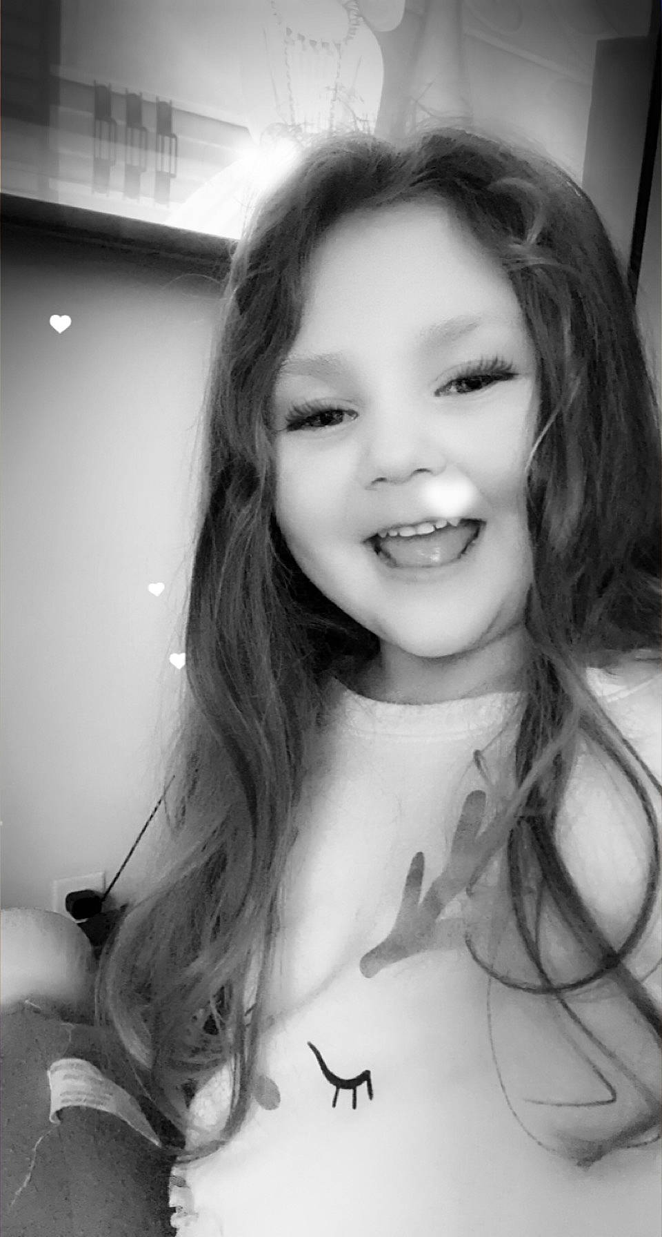 Blaire is registered to the contest to win money with this photo: black, black_and_white, eye, eyebrow, eyelash, face, facial_expression, flash_photography, gesture, hair, happy, iris, jaw, joy, lip, mouth, person, shoulder, skin, smile