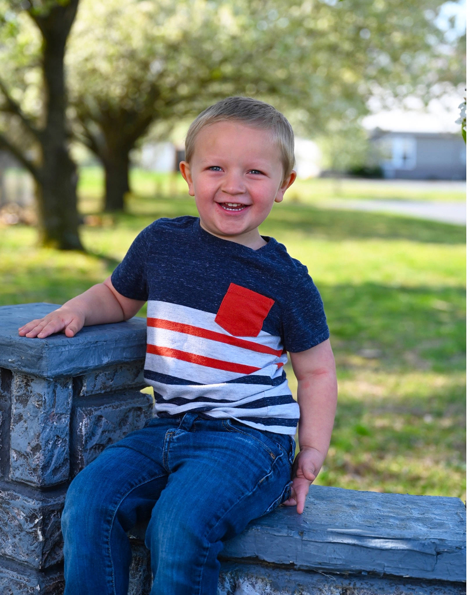 Aaron is registered to the contest to win money with this photo: clothing, denim, flash_photography, grass, happy, human_body, jeans, joy, leaf, leg, leisure, people, people_in_nature, person, plaid, plant, sleeve, smile, standing, t_shirt