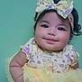 Allison joined the competition — help win amazing prizes! adorable, baby, child, chubby_cheeks, cute, cute_outfit, frilly_skirt, green_background, happy, headband, indoor, infant, person, portrait, sitting, smile, soft_lighting, toddler, yellow_bow, yellow_dress
