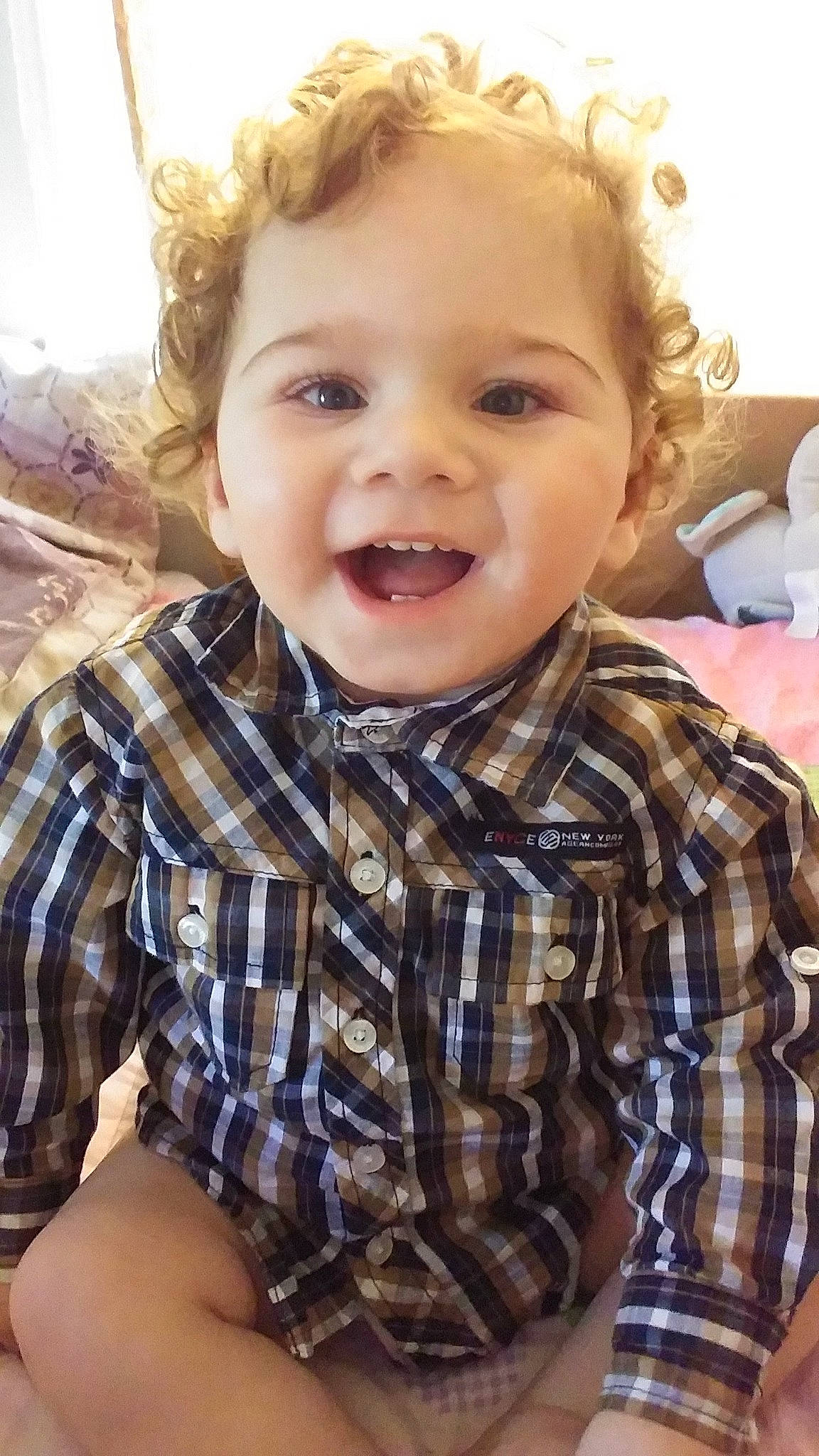 Joaquin joined the competition — help win amazing prizes! baby, blond, cheek, child, chin, design, eye, face, facial_expression, fun, hair, head, lip, nose, pattern, person, plaid, skin, smile, toddler